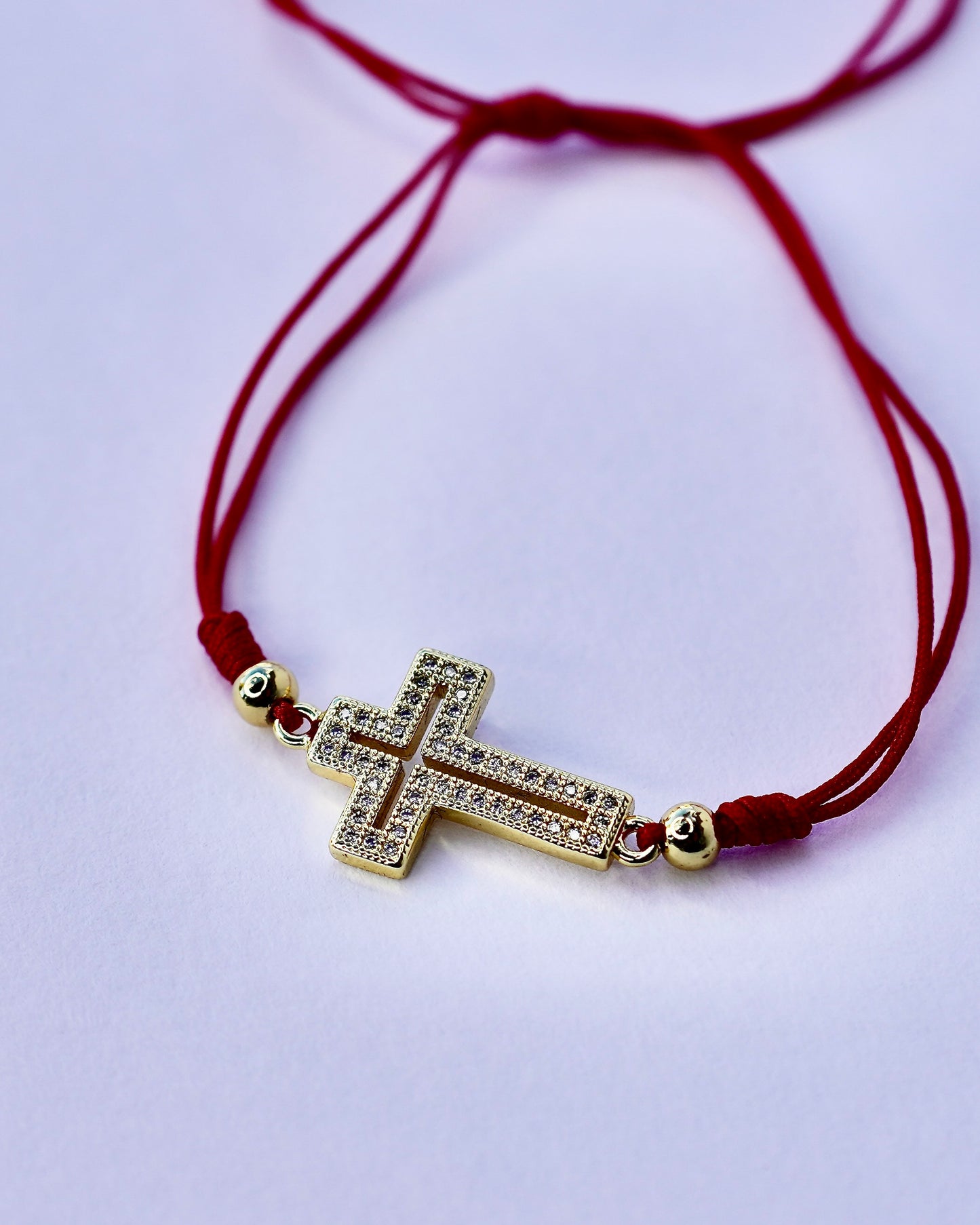 Gold-Plated Cross Bracelet with Red Adjustable Cord