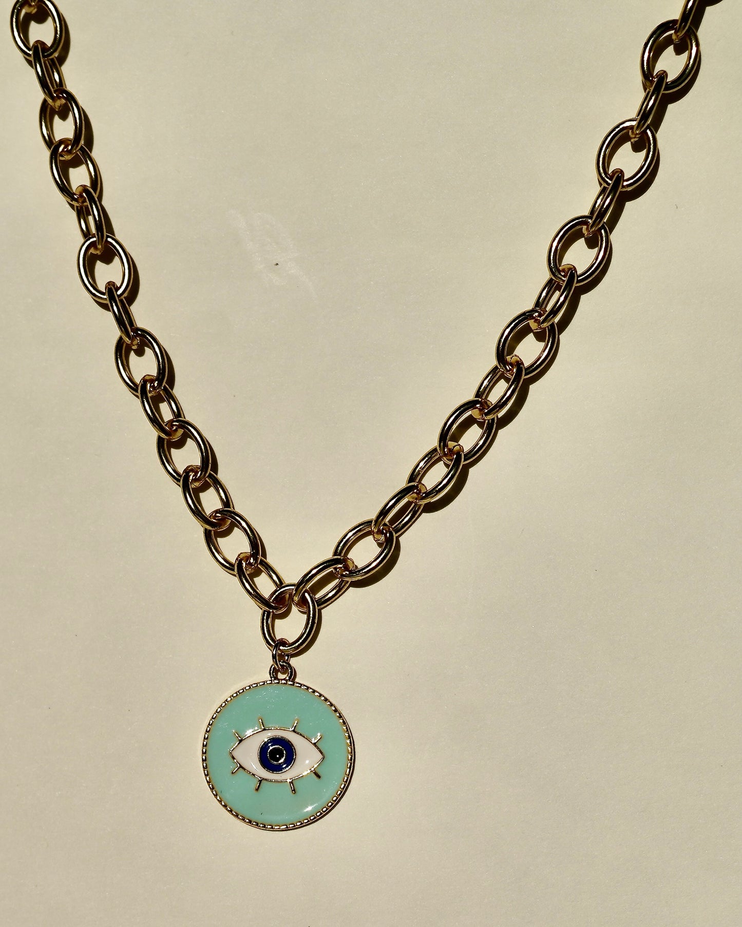 Collar Dorado con Dije Redondo de Ojo Protector en Turquesa